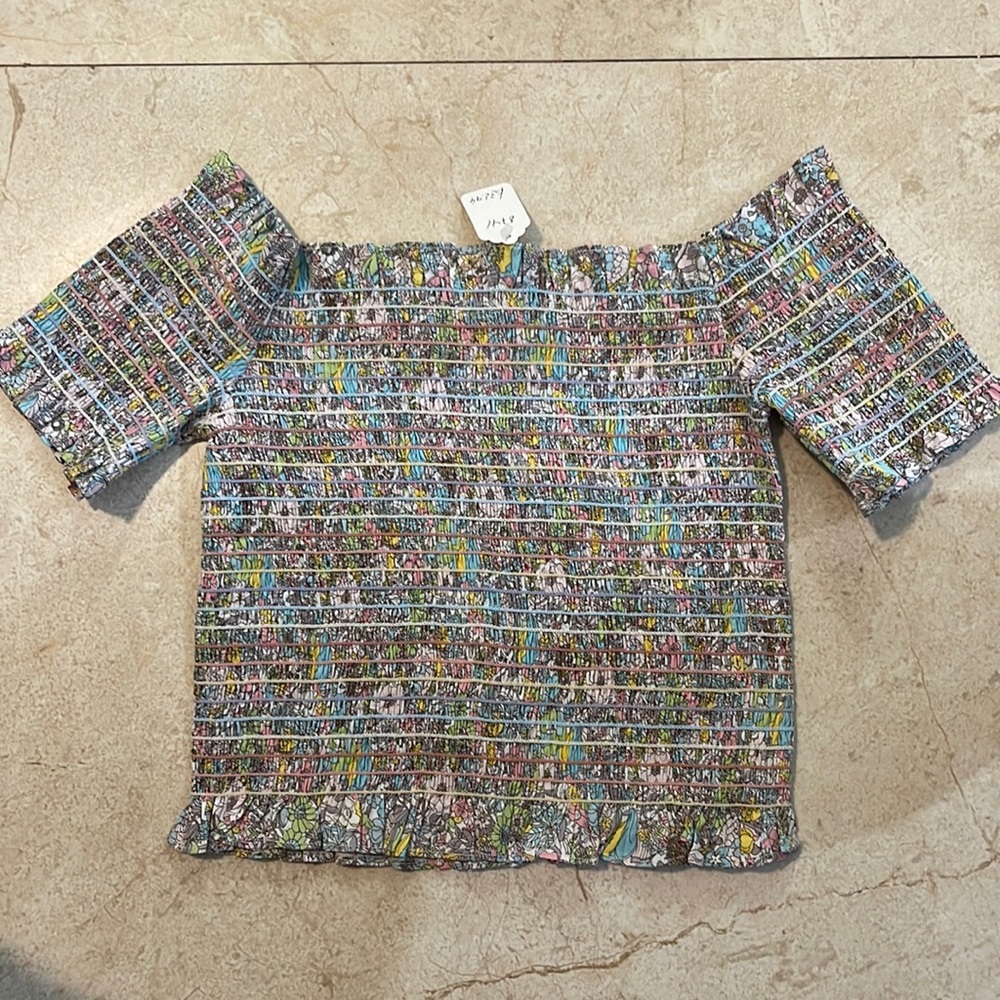 Never worn top. Brand is Storia size medium.